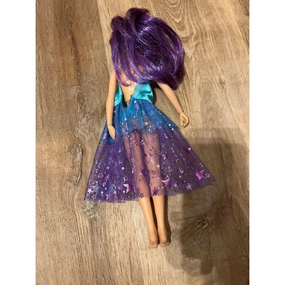 Vintage 1985 Hasbro Jem and the Holograms Doll Purple Hair Star Dress 80s Toy‎
